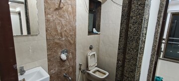 Bathroom in 2.5 BHK Apartment at Neminath Imperia, Andheri West – for Rent