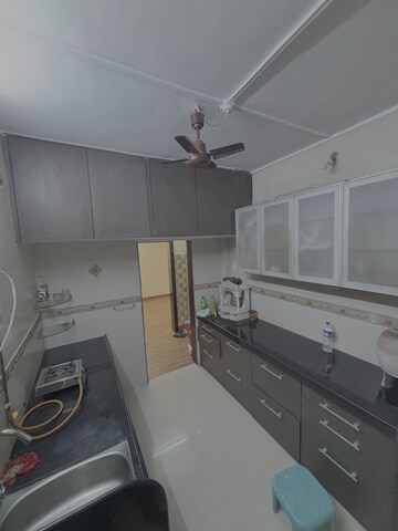 Kitchen in 2 BHK Apartment at Nirmal Jeevan CHS, Kopri – for Rent