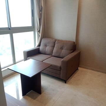 Living Room in 1 BHK Apartment at Hiranandani Regent Hill, Powai – for Rent