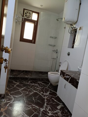 Bathroom in 4 BHK Builder Floor at New Friends Colony – for Rent