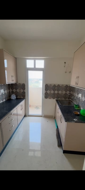 Kitchen in 1 BHK Apartment at Signature Global Golf Greens, Sector 79 – for Sale