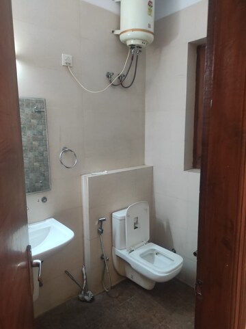 Bathroom in 1 RK Apartment at Ansal Sushant Estate, Sector 52 – for Rent