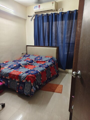 Bedroom in 2 BHK Apartment at Suyash Tower, Kopar Khairane – for Sale