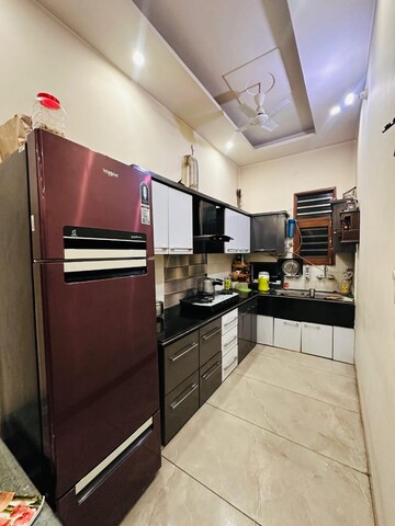 Kitchen in 1.5 BHK Independent House at Dhakoli – for Sale