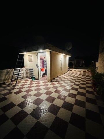 Terrace in 1.5 BHK Independent House at Dhakoli – for Sale