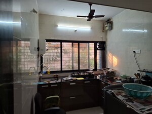 Kitchen in 2 BHK Apartment at Vashi Sector 14 – for Sale