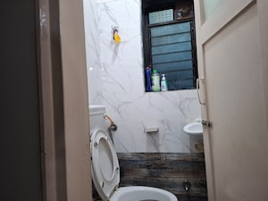 Bathroom in 2 BHK Apartment at Vashi Sector 14 – for Sale