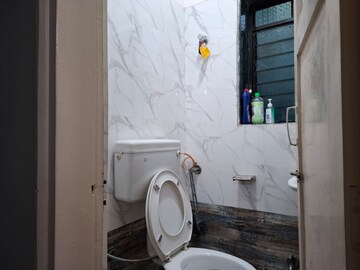 Bathroom in 2 BHK Apartment at Vashi Sector 14 – for Sale