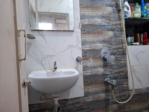 Bathroom in 2 BHK Apartment at Vashi Sector 14 – for Sale