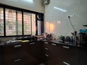 Kitchen in 2 BHK Apartment at Vashi Sector 14 – for Sale