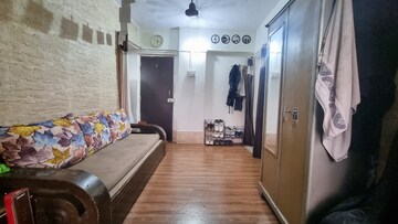 Living Room in 1 BHK Apartment at Rishikesh CHS, Malad West – for Sale
