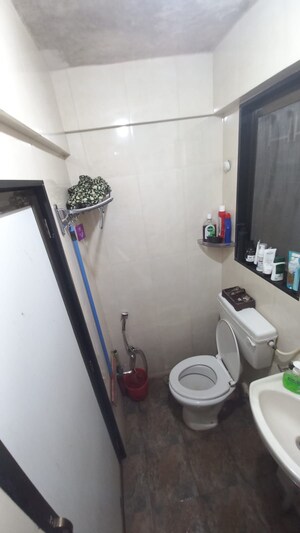 Bathroom in 1 BHK Apartment at Tilak Nagar – for Sale