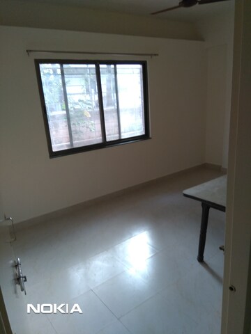 Room in 1 BHK Apartment at Sameer Housing Society, Dhankawadi – for Rent