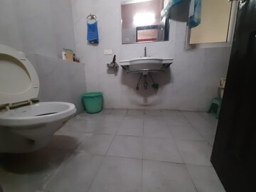 Bathroom in 4 BHK Apartment at Ramprastha Greens, Vaishali Sector 7 – for Rent