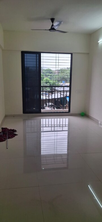 Living Room in 2 BHK Apartment at Elegant Yashraj Heights, Ghansoli – for Rent