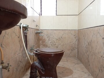 Bathroom in 2 BHK Apartment at Orchid Residency, Govandi East – for Rent