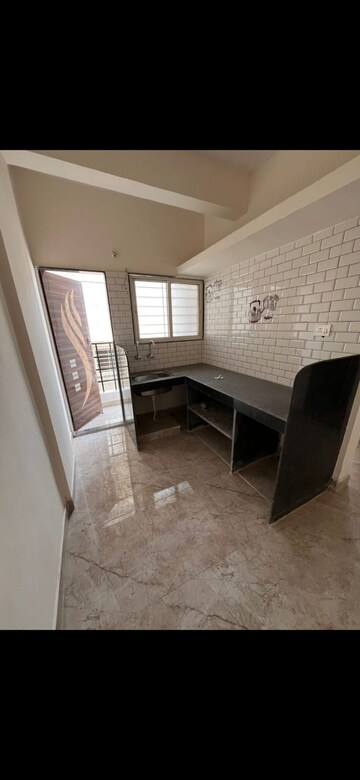 Kitchen in 2 BHK Apartment at Wadgaon Sheri – for Rent
