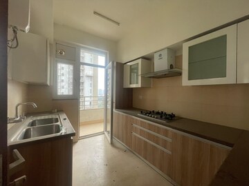 Kitchen in 2 BHK Apartment at Puri Emerald Bay, Sector 104 – for Rent