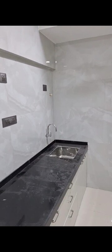 Bathroom in 2 BHK Apartment at Poonam Vaishno Heights, Malad East – for Rent