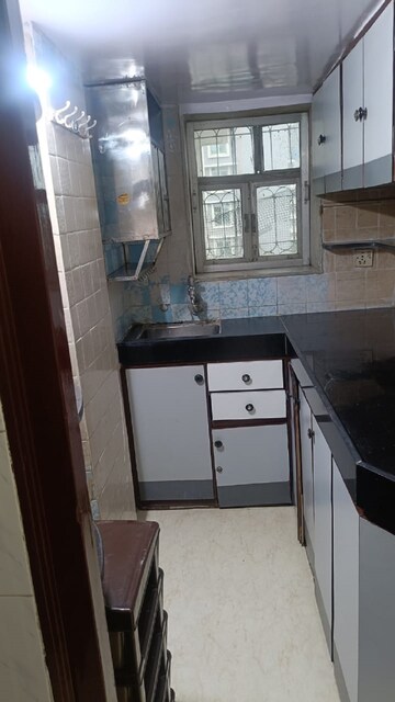 Kitchen in 1.5 BHK Apartment at Bandra West – for Rent