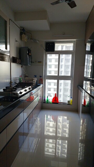 Kitchen in 2 BHK Apartment at Godrej Emerald, Ghodbunder Road – for Rent