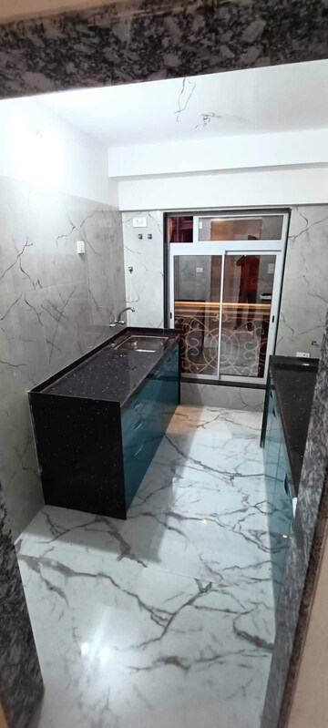 Kitchen in 1 BHK Apartment at Sai Crystal Empire, Nalasopara East – for Sale
