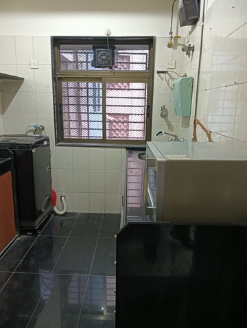 Kitchen in 2 BHK Apartment at Kalpana CHS Vile Parle, Vile Parle East – for Rent
