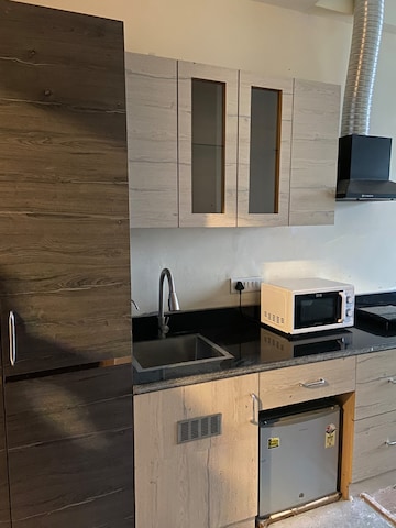 Kitchen in Studio Apartment at Gaur City Mall, Sector 4 Greater Noida – for Rent