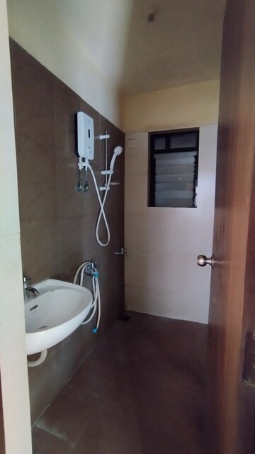 Bathroom in 1 BHK Apartment at Raunak City Phase 3, Kalyan West – for Rent