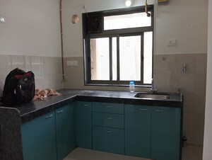 Kitchen in 1 BHK Apartment at Runwal Eirene, Balkum Pada – for Sale