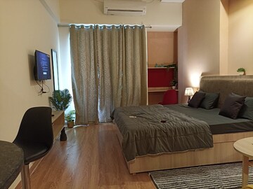 Bedroom in Studio Apartment at Gaur City Center, Sector 4 Greater Noida – for Rent