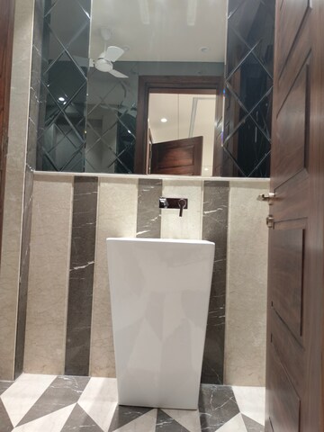 Bathroom in 3.5 BHK Apartment at Boutique Residential Apartments C-253, Defence Colony – for Sale