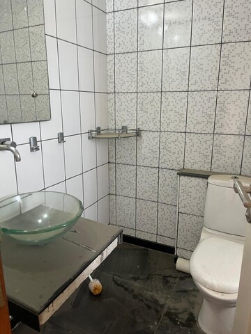 Bathroom in 3 BHK Apartment at Unitech Uniworld Gardens, Sector 47 – for Sale