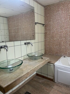 Bathroom in 3 BHK Apartment at Unitech Uniworld Gardens, Sector 47 – for Sale