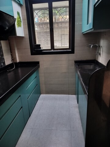 Kitchen in 2 BHK Apartment at Indraprastha CHS Nerul, Nerul Sector 19a – for Rent