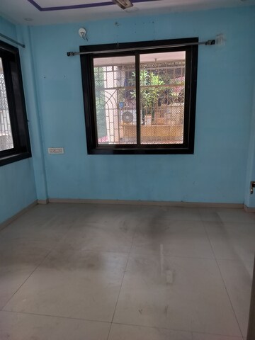 Room in 2 BHK Apartment at Indraprastha CHS Nerul, Nerul Sector 19a – for Rent