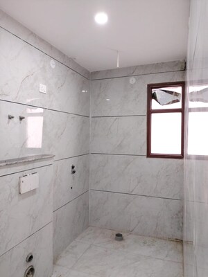 Bathroom in 3.5 BHK Builder Floor at Mahavir Enclave – for Sale