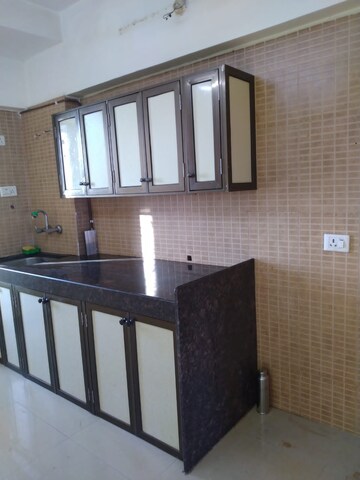 Kitchen in 2 BHK Apartment at Kamanwala Manavsthal, Malad West – for Rent