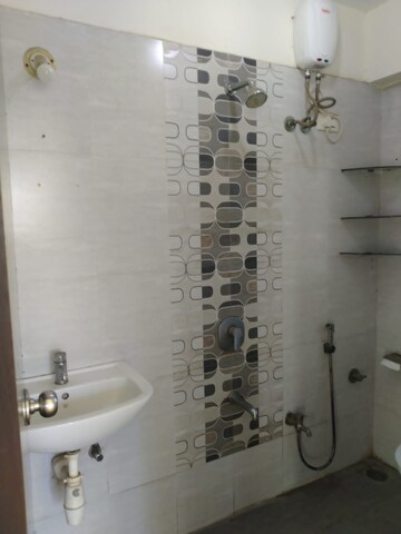 Bathroom in 2 BHK Apartment at Kamanwala Manavsthal, Malad West – for Rent