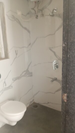 Bathroom in 1 BHK Apartment at Raunak Bliss, Ghodbunder Road – for Sale