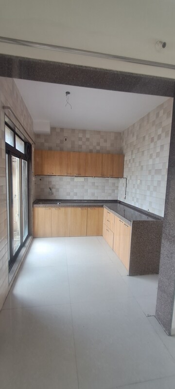 Kitchen in 3 BHK Apartment at Trishul Symphony, Kharghar – for Sale