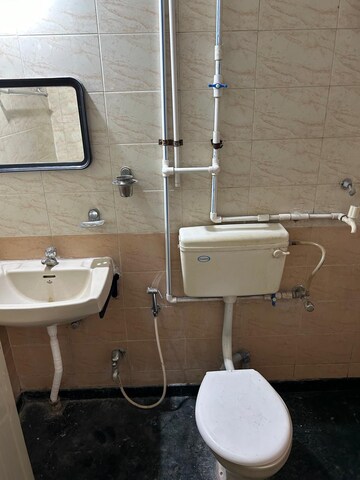 Bathroom in 2 BHK Apartment at Raviraj Yellow Blossoms, Ghorpadi – for Rent