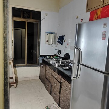 Kitchen in 3 BHK Apartment at Aalap CHS, Hindu Colony – for Rent