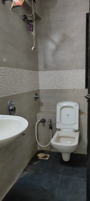 Bathroom in 2 BHK Apartment at Sumeru CHS, Andheri West – for Rent