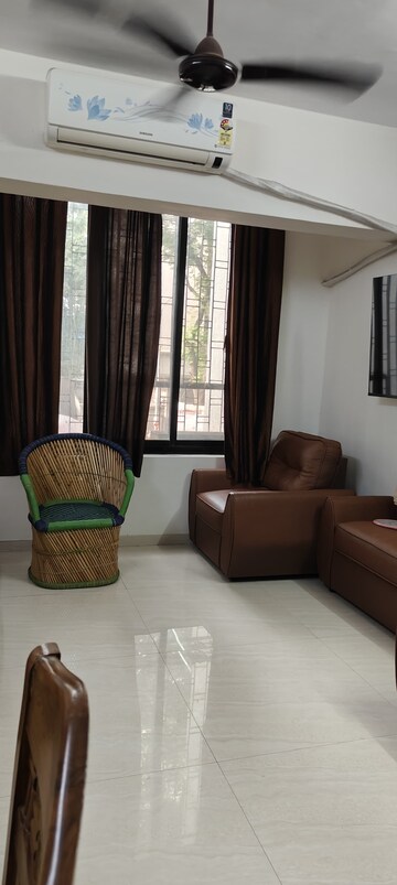 Living Room in 2 BHK Apartment at Sumeru CHS, Andheri West – for Rent