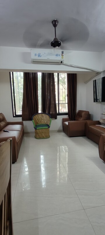 Living Room in 2 BHK Apartment at Sumeru CHS, Andheri West – for Rent