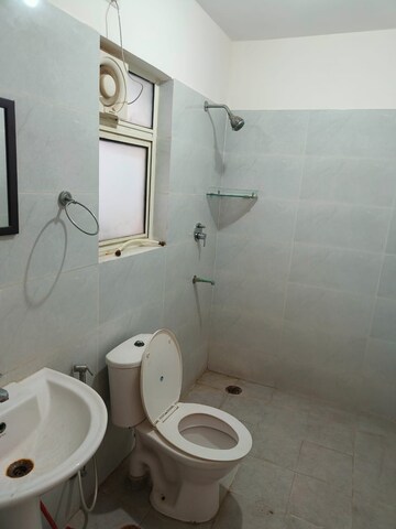 Bathroom in 3 BHK Builder Floor at Puri Aman Vilas, Sector 89 – for Rent