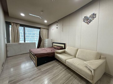 Living Room in 3 BHK Apartment at Lodha World Crest, Worli – for Rent