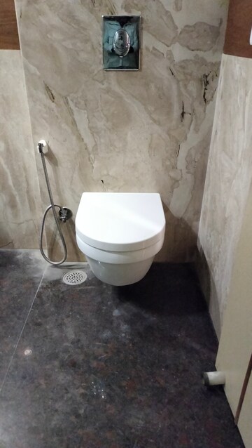 Bathroom in 4 BHK Apartment at Vasant Vihar – for Sale