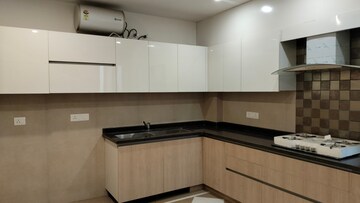 Kitchen in 4 BHK Apartment at Vasant Vihar – for Sale